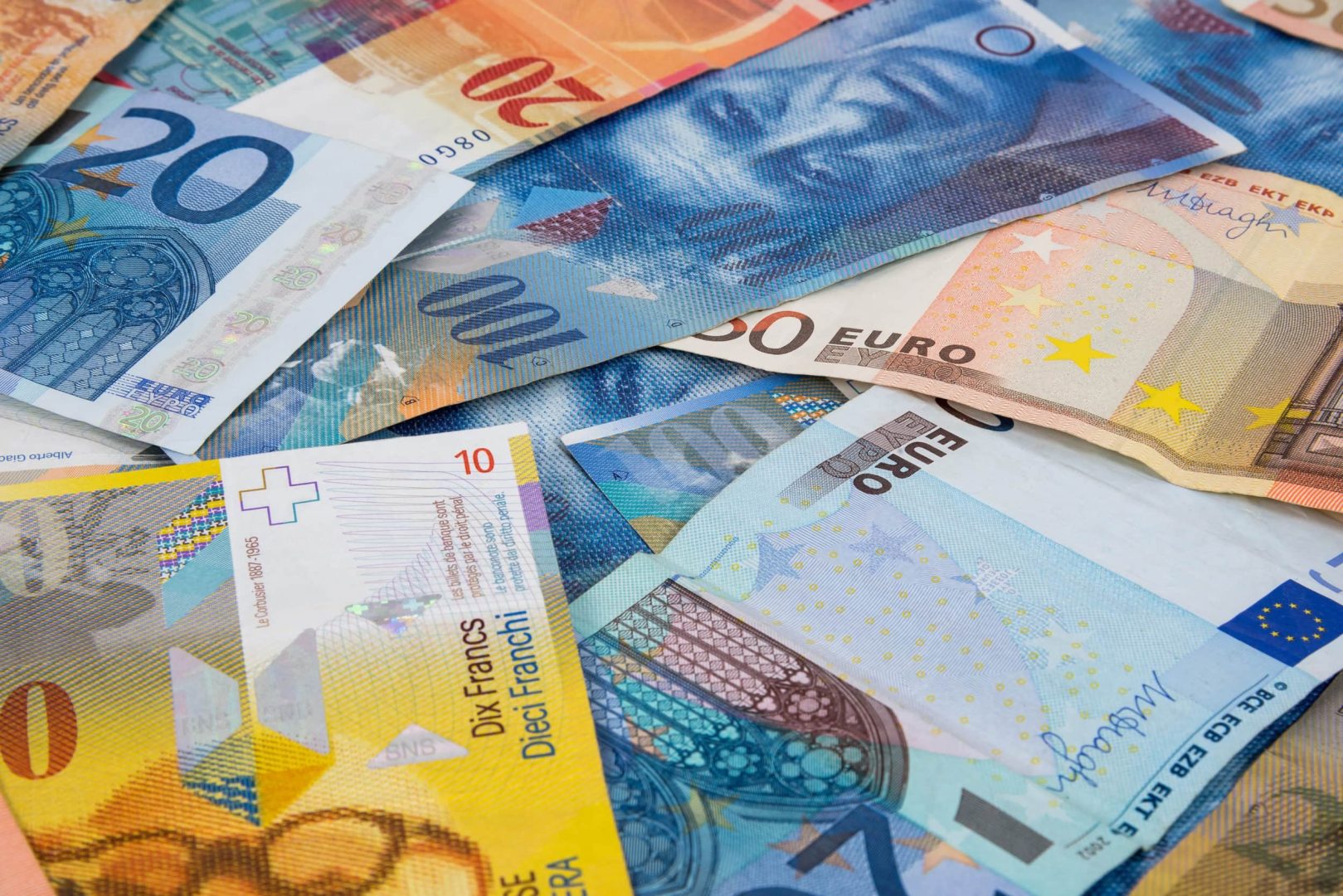 euro and chf banknotes as background